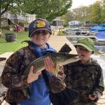 Nicole Noble of Brussels captured the moment where her son, Beckett, proudly displayed his pike, much to the shock of his brother, Jacoby.