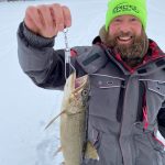 Matt Neumann of Hanmer was fishing with his wife Christelle on a lake north of Sudbury when he caught and released this lake trout to swim another day.