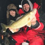 Adam Storer of Elmira spends most weekends fishing on Belwood Lake with his son Luke, who recently caught this 20-inch walleye.