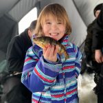 Amber McIsaac of Powassan shared this pic of her daughter Emily, who was having a ball catching perch on the South River in Powassan on a sunny day in January. She was using a gold and red Dinner Bell spoon with a minnow head and her favourite jigging rod!