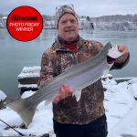 Photo Friday winner, Jeff Poulsen of Virgil, caught his first steelhead from the bank of the lower Niagara River on Christmas Day 2020 using a red and white streamer.