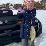 Matt Sinden-Hanson of Port Rowan submitted this photo of his three-year-old daughter, Taylor, showing off this rock bass she pulled from the pond while dad and grandpa watched with pride.