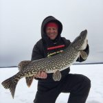 While targeting trout on a blistery cold day, Rob Shaffer of Dryden decided to change his presentation to a blue 3/8 oz jig with a white five-inch fluke when this pike struck five feet from the surface of the ice.