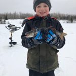 Stephen Foley of Cochrane shared this photo of Nicholas, 8, proudly holding his first splake.