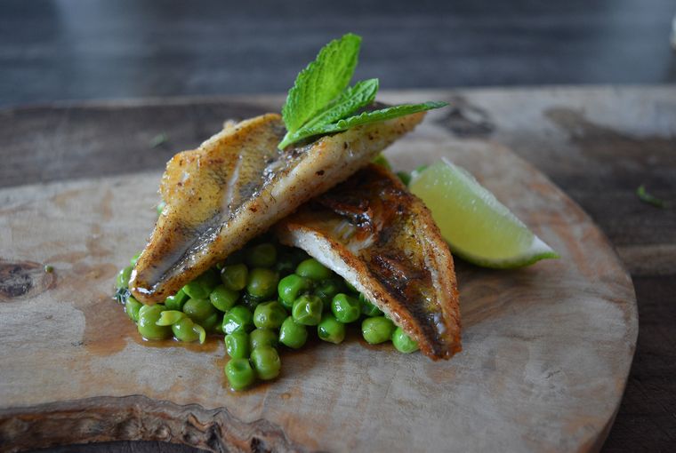 Pan-seared perch with green peas and mint