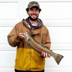 Clark Wilkinson of Walkerton spent a rainy day on the bank of the Saugeen River near Walkerton and caught this 22.5-inch rainbow on a classic Rapala minnow.