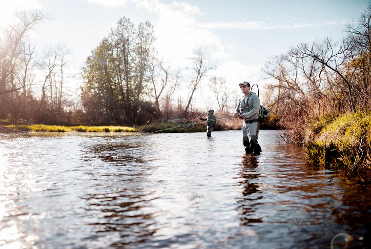 Man fishing in a river