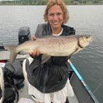 Julie Bianchi of Barrie caught her first whitefish while fishing on Lake Simcoe's Kempenfelt Bay using a River Reaper soft plastic lure.