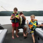 A July 2020 fishing trip in the Madawaska Valley got exciting for Graham Keller of Whitby when his daughter Charlotte cranked in her first largemouth bass. Her brother Emerson was there to help with the net.