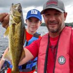 Carter Benwell was happy to pose after landing his first walleye while trolling Mississippi Lake with family friend and OOD contributor Justin Hoffman.