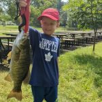 Mike Kroetsch of Kitchener was fishing with his son, Owen, at their local club when Owen hooked into the biggest fish he ever caught. Yay, Owen!