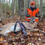 Michele Henthorne of Lakehurst was happy to harvest her first buck, a five-pointer, after seeing it on a trail camera; she was grateful to her husband John, who aided the swampy retrieval.