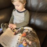 Adam Schram of Long Point says Connor Schram, 2, gets excited when the new OOD issue comes out; he calls them “his papers.”