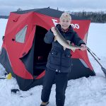 Wayne Lacko of Winnipeg is proud of his wife, Ramona, for catching her first lake trout during her first time ice fishing at Sioux Narrows this past winter.