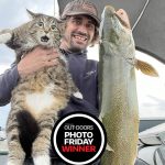 Photo Friday winner, Jay Crowells of Milford, says his cat, Zeppy, wanted to know why Jay spent so much time on a FMZ 20 lake. Here they are with the spoils of 50/50 method snap-weight trolling with a Michigan stinger and shoehorn spoon.