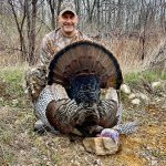 Pierre Fournier of Greely harvested a giant wild turkey after waiting for hours on opening day. Patience is key, he noted.