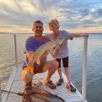 Andrea Zavitz of Sault Ste Marie sent in a photo of her husband, Ryan and their son, Daniel, catching bites off the dock at Big Point, St. Joseph Island.