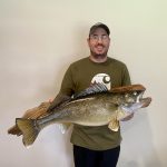 Dustin Latham of Gravenhurst caught this incredible 12-pound, 10-ounce walleye with his older brother Jason on the second-last ice fishing day of the season.