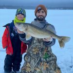 Kenny Duplessis of North Bay shared a memorable moment with his son while landing a 27-inch walleye.