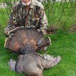 Erwin Anthoefer of Holland Landing with a turkey he harvested two days before his birthday! He used a Baikal shotgun for his hunt.