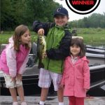 Photo Friday winner Katherine Stadnyk of Toronto, who sent this throwback picture of her with her siblings on their first fishing trip together at a lake house. Her brother caught this bass.