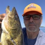 Renzo Cassin with a 29-inch walleye that was released.