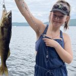 Alexa Narezny of Renfrew with a pickerel she caught with her dad and brother.