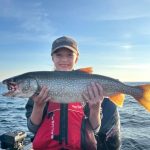 Hannah Graves of Parry Sound with a Georgian Bay laker. She is serious about trout fishing.