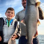 Brooks Taylor of Bolton was fishing with his dad, Adam, when he caught his first chinook salmon. He grabbed the net without hesitation when it was time to land the fish.