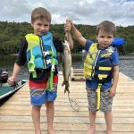 Derek Topham sent in this shot of his sons Griffin and Gavin holding a trout they caught at the cottage.