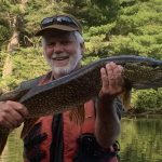 Mark Matassa of Huntsville wasn’t expecting to catch such a big pike. Luckily, his nephew was there to capture the moment before the fish was released.