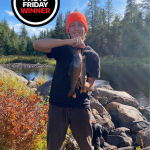 Photo Friday winner Benjamin Hutchins of Woodstock, who caught this beautiful speckled trout on a recent father-son fishing trip while using a white spinner.