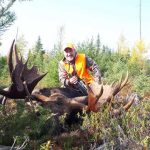 Christian Kozelj of Stoney Creek on the first morning of his hunting trip. He shot this bull that scored 6/8 after a 60-day drying period.