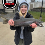 Photo Friday winner Kaylin Kerr of Burlington, who caught her first steelhead at Port Dalhousie. She was thrilled after hooking this beauty.