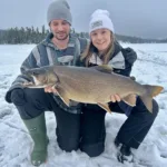 Andrea Poirier-Cornell of Atikokan caught a monstrous (and personal-best) lake trout that she was happy to show her brother, Andrew.