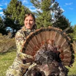 Ashley Casperson of Washago squeezed her six-month-old baby bump into some camo for a successful solo stalk after calling in this big tom in 76A.