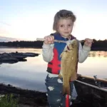 Ben Macfarlane of Richards Landing took this photo of his five-year-old daughter, Aubrey, holding the catch of the day from the shore of St. Marys River. Dad was proud.