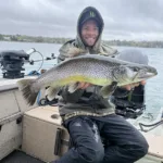 Clark Green of Shallow Lake landed a most-colourful trout while trolling Georgian Bay as part of the Lures and Lines Spring Trout Derby; he released the big brown.