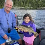 Dorothy Monteith of Kenora captured her granddaughter’s first keeper on beautiful Lake of the Woods, caught alongside her grandfather, John Monteith.