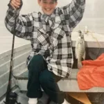 Janell Flatt of Dunnville had a great day after boarding this bass. The smile says it all! Her dad Lawrence was happy to be a part of the moment.