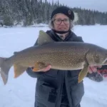 Loretta Bilous of Dryden toughed it out in blizzard conditions and it paid off when she hooked this 35.5-inch trout. It was the last day of a camping and fishing trip.