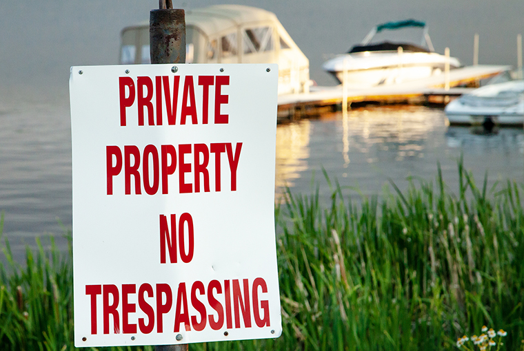 private property sign on water