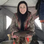 Stacie Burton of Cochrane caught her first rainbow trout through the ice on Commando Lake; it was 17.5-inches, and beautifully coloured.