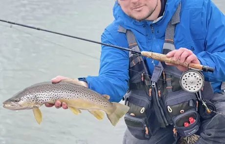 Tommy Biers of Cochrane caught-and-released this 20-inch brown trout using a wooly bugger Black on Lake Commando.