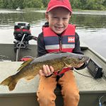 Charles Mercier of Belleville, 5, caught his first walleye while casting a Toronto Wobbler on the Moira River with his Uncle Shane.