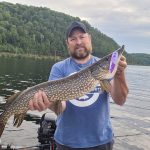 Gavyn Lee of Drayton caught a nice pair of pike with his dad Cory (shown), on Baptiste Lake while trolling for lake trout at 35 feet in 50 feet of water with Dipsy Divers.