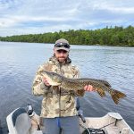 Joe Spratt of Gananoque shows off his best pike caught during a weekend fishing trip on Red Horse Lake.