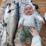 Scott Neureuther of Goulais River brought home a salmon as big as his 5-month-old, Edmund.