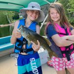 Russell Gregory of Etobicoke¬ was delighted when his grandson Pherson, 10, caught-and-released this largemouth bass on Canada Day from Lake Temagami while sister Emmie, 8, watched in awe.