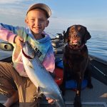 Chris McDonald of Owen Sound documented Mason, 11, with his personal-best salmon caught on a seven-colour leadcore rod with a gold spoon from Georgian Bay. Remmy the lab was pleased, too!